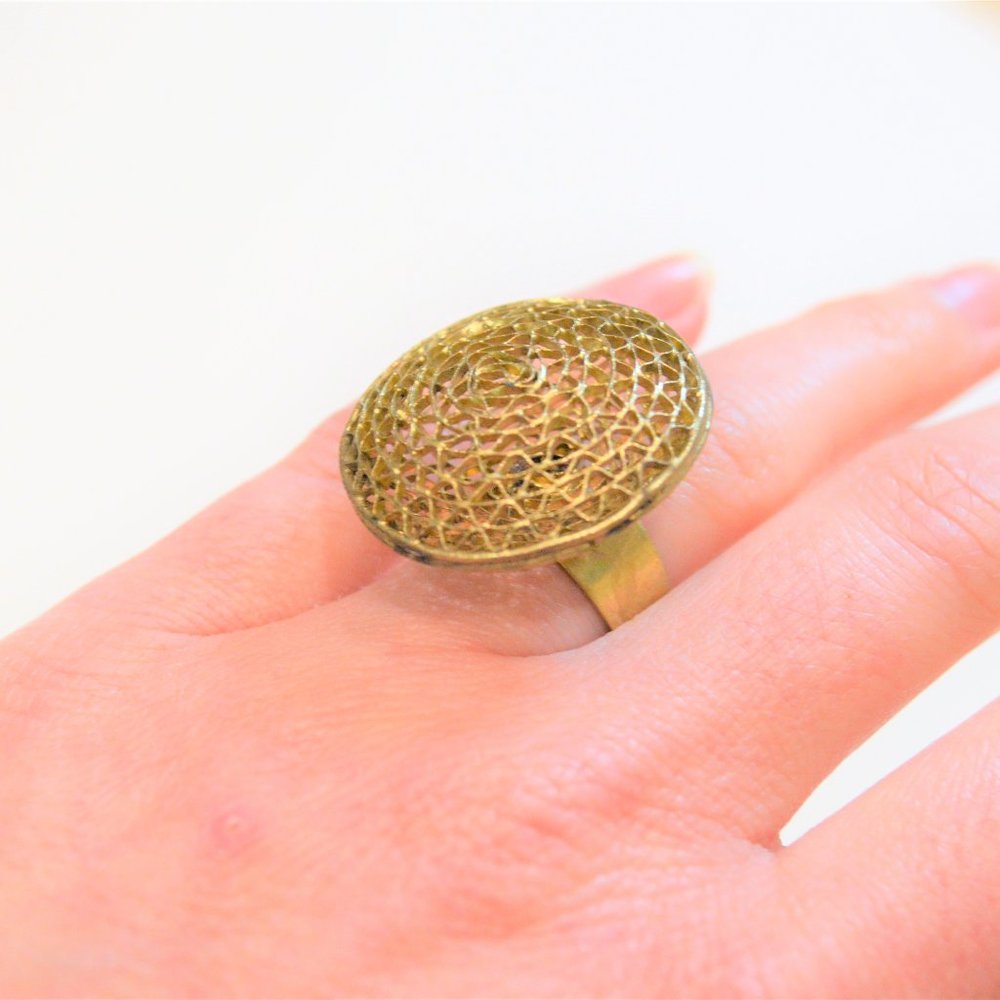 Gold tone wave ring